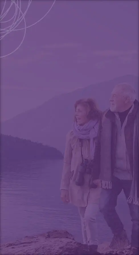 Couple walking by a lake for mobile